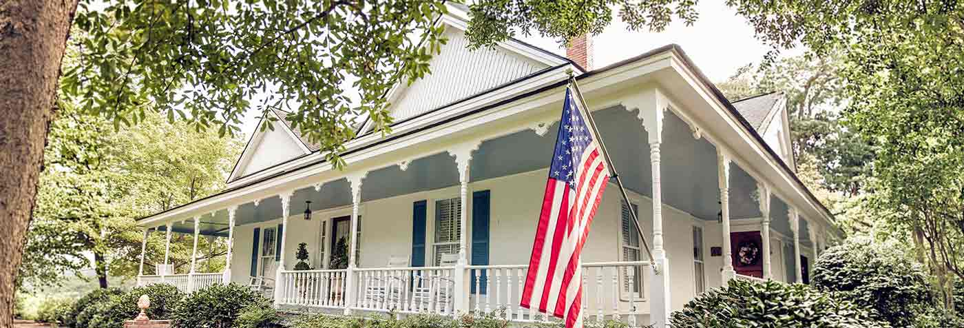 white house with large front porch